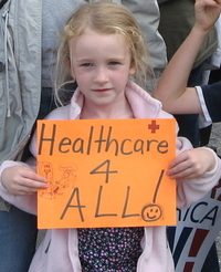 Girl with organe healthcare sign